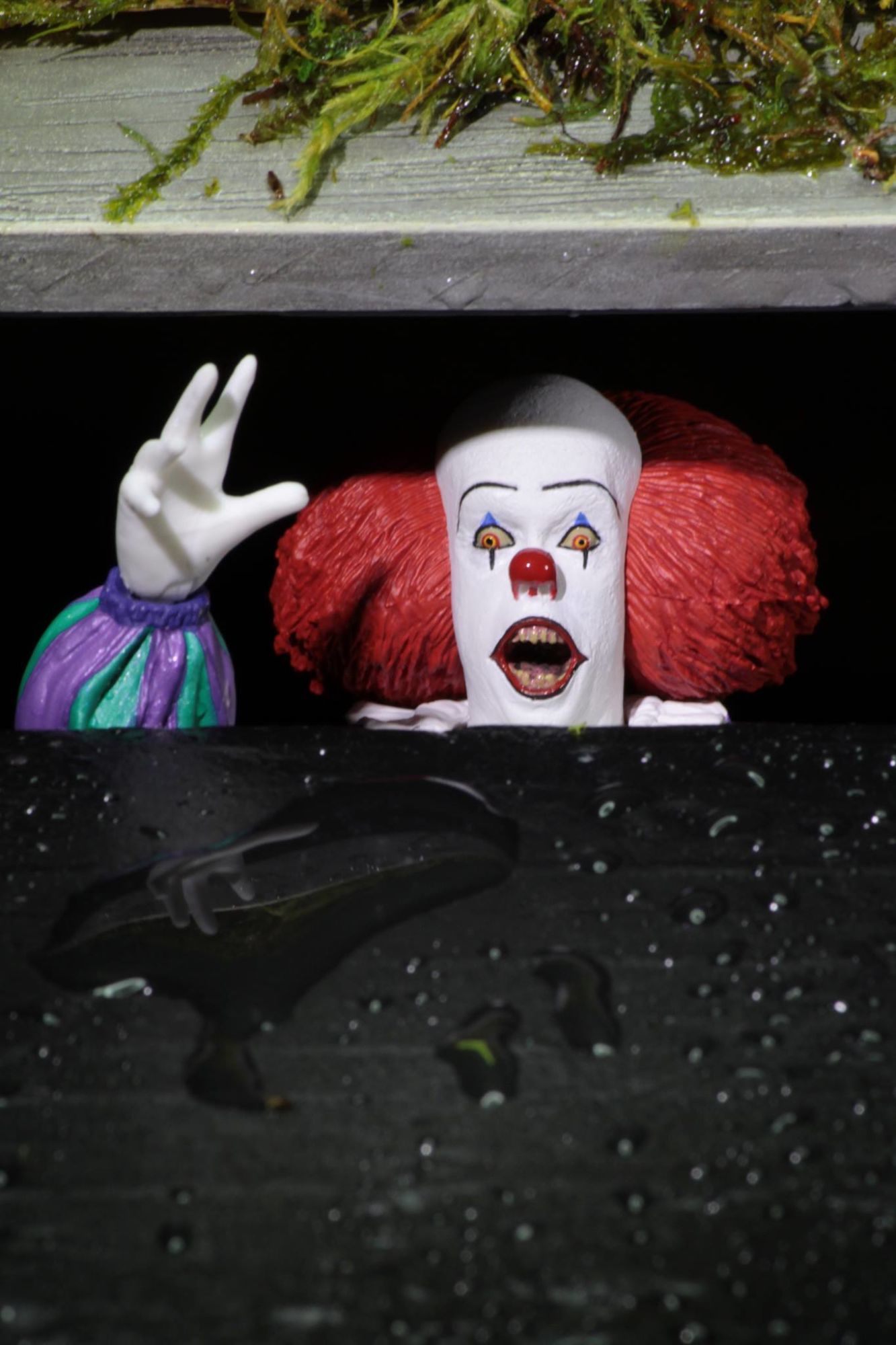 Tim Curry's Pennywise Gets New Mezco Designer Series Figure With Monster  Hand and Alternate Head - Bloody Disgusting