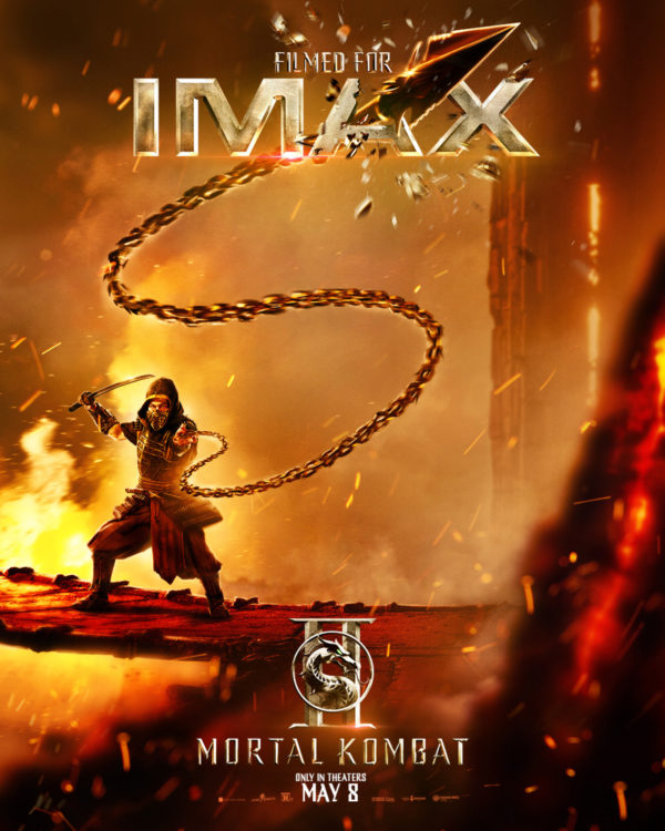 An action-packed IMAX poster for 'Mortal Kombat II' featuring a character wielding a chain in a fiery, dramatic setting. The text 'FILMED FOR IMAX' and release date 'MAY 8' are prominently displayed.