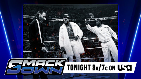 Sami Zayn stands in the wrestling ring with a serious expression, while Trick Williams, dressed in a white fur coat, gestures towards him, flanked by another opponent in white. The background shows a lively crowd, and the scene is presented in a monochrome style with colorful accents, emphasizing the WWE SmackDown branding.