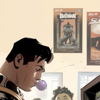Superboy-Prime Reads Absolute Batman As Well As Absolute Superman